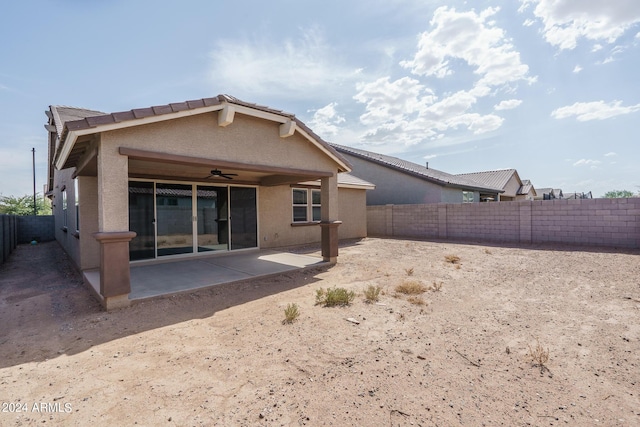 back of house featuring a patio and ceiling fan