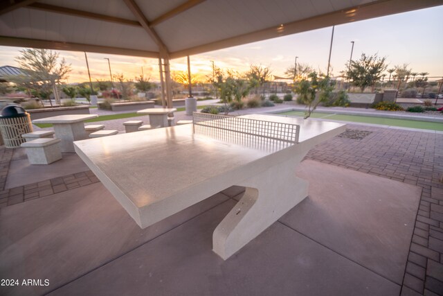 patio terrace at dusk with a gazebo