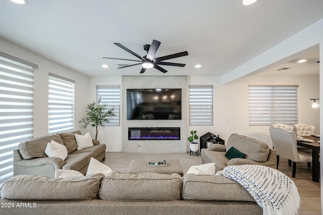 18813 W Solano Dr, Litchfield Park, AZ 85340 - living area with a ceiling fan, a fireplace, and recessed lighting
