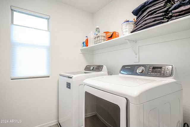 18813 W Solano Dr, Litchfield Park, AZ 85340 - laundry room with separate washer and dryer, wood finished floors, and baseboards