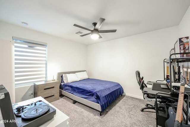 18813 W Solano Dr, Litchfield Park, AZ 85340 - carpeted bedroom featuring a ceiling fan, baseboards, and an office area