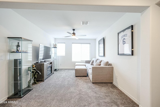 18813 W Solano Dr, Litchfield Park, AZ 85340 - carpeted living room featuring ceiling fan and baseboards