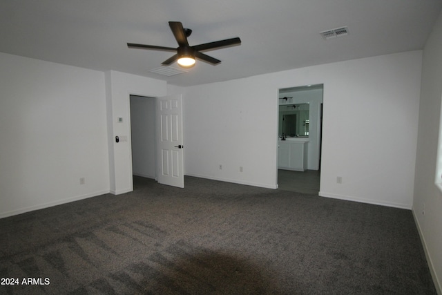 18813 W Solano Dr, Litchfield Park, AZ 85340 - unfurnished room featuring ceiling fan, dark carpet, and baseboards