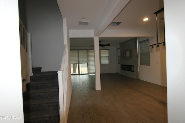 18813 W Solano Dr, Litchfield Park, AZ 85340 - hall with dark wood finished floors, stairway, and recessed lighting