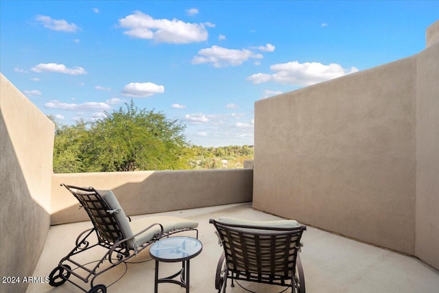 view of patio / terrace featuring a balcony