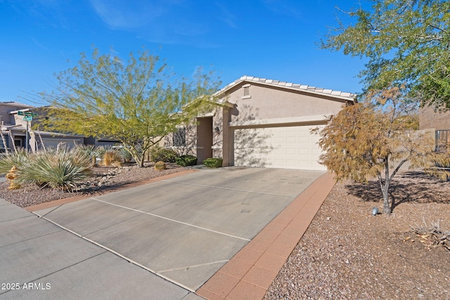 ranch-style home featuring a garage