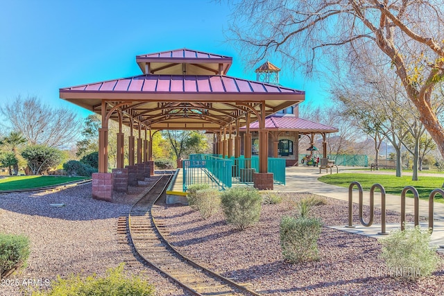 view of property's community featuring a gazebo and a playground