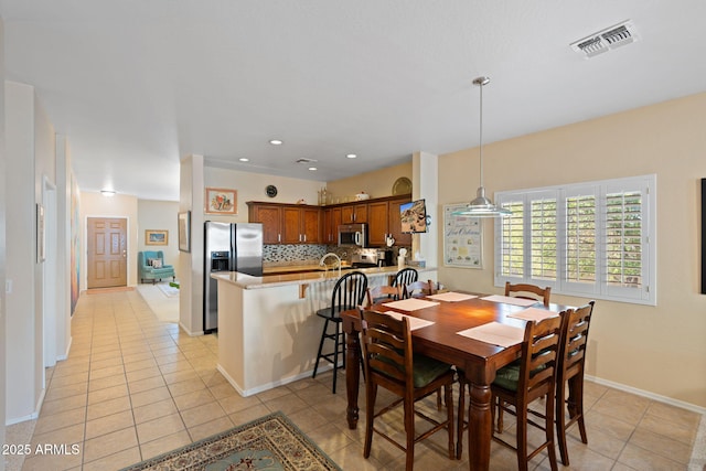 view of tiled dining area