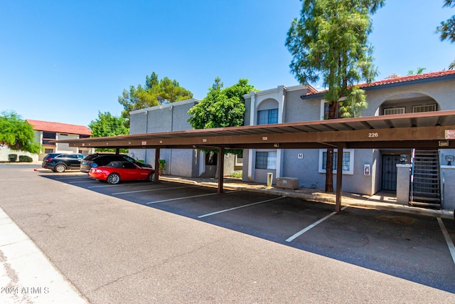 view of car parking with a carport