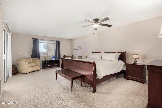 carpeted bedroom with a ceiling fan