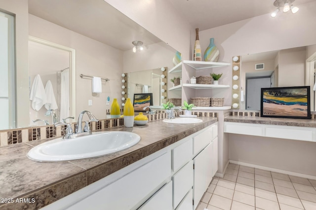 full bath with tile patterned floors, visible vents, a sink, and double vanity