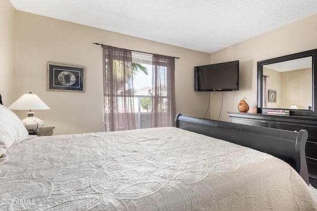 bedroom featuring a textured ceiling