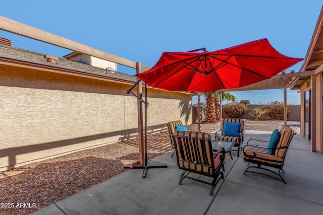 view of patio featuring outdoor lounge area and a fenced backyard