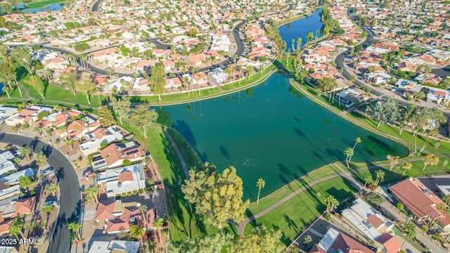 bird's eye view with a water view and a residential view