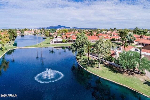 bird's eye view with a residential view and a water view