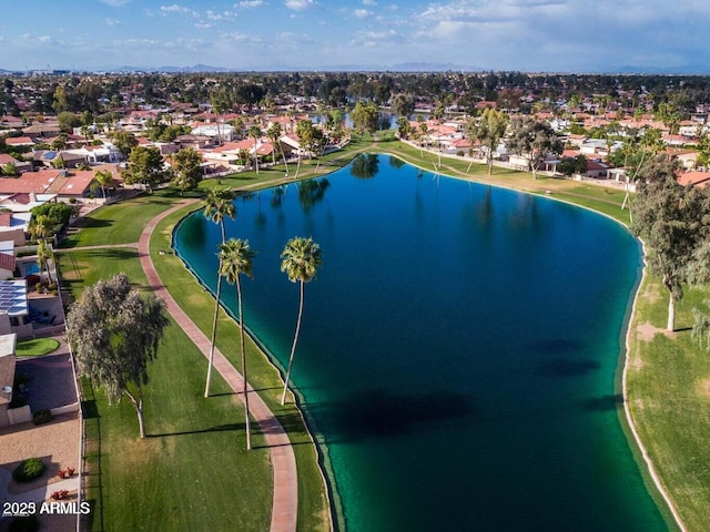 bird's eye view with a water view and a residential view