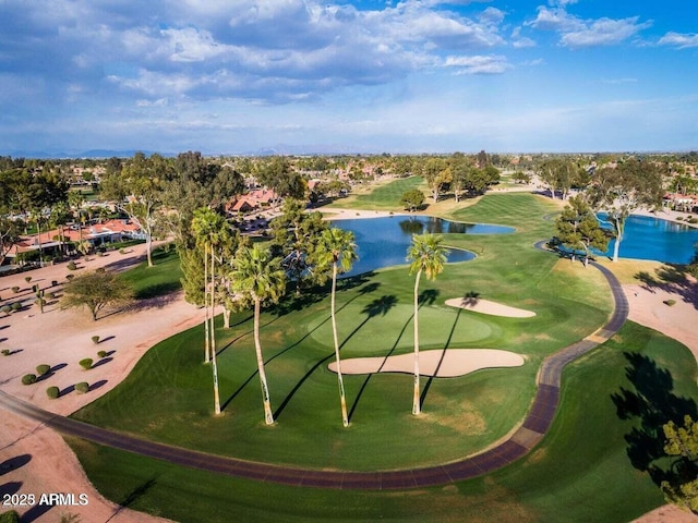 bird's eye view with golf course view and a water view