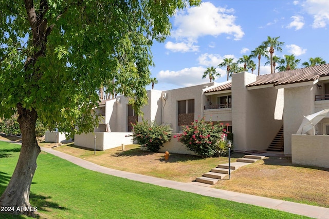 view of community featuring a lawn