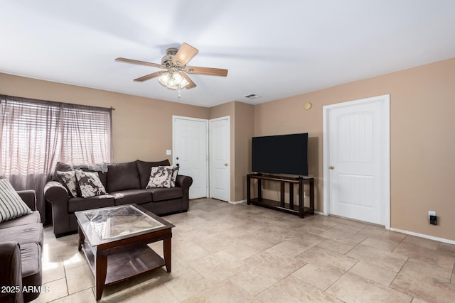 living room with ceiling fan