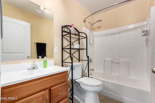 full bathroom featuring vanity, tile patterned floors, washtub / shower combination, and toilet