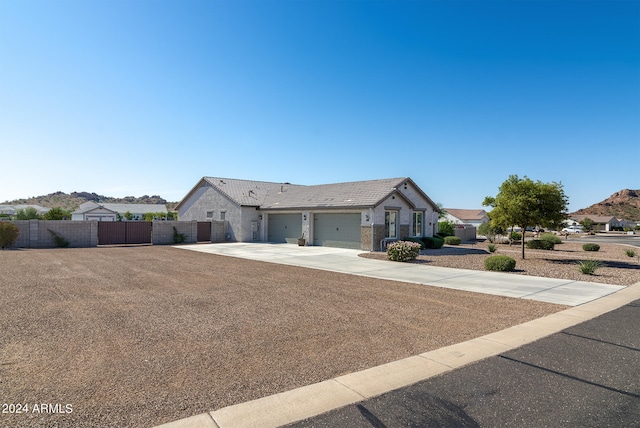 ranch-style house featuring a garage