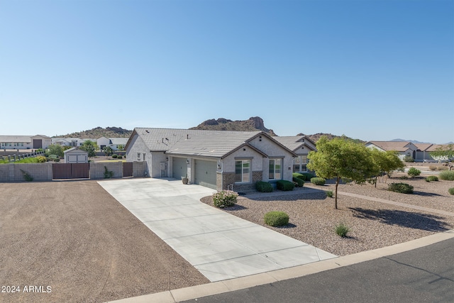 ranch-style house featuring a garage