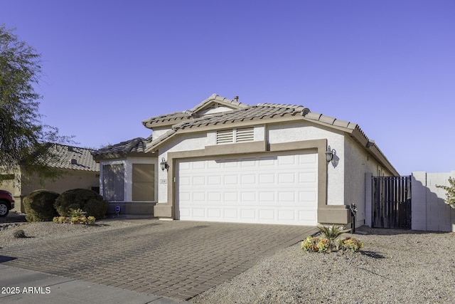 view of front of home with a garage