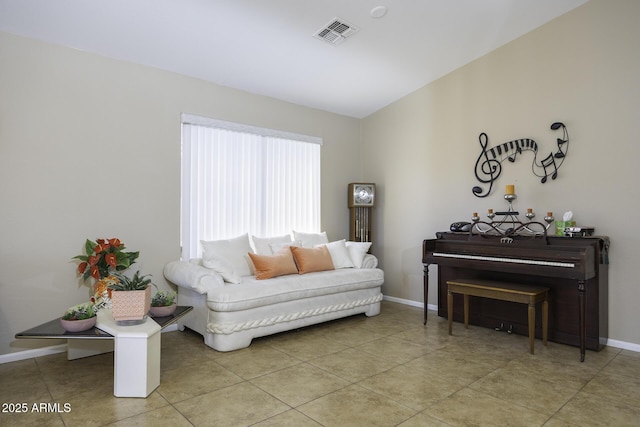 sitting room with light tile patterned floors