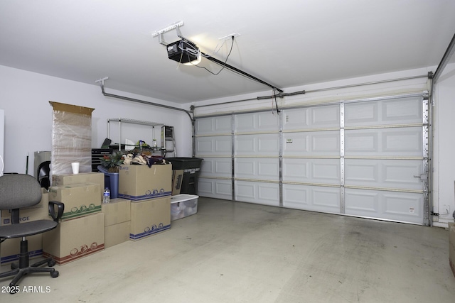 garage featuring a garage door opener