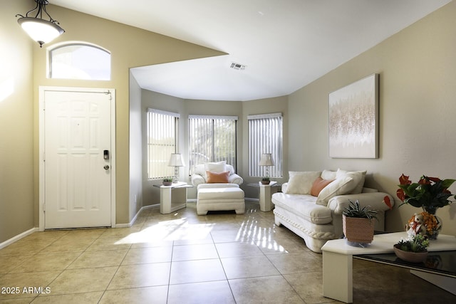 living room with light tile patterned flooring