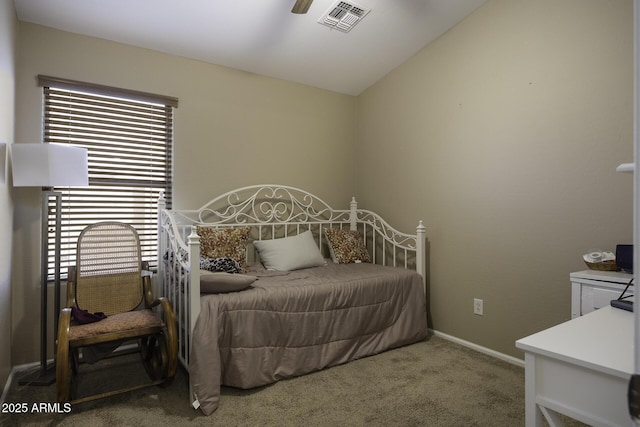 carpeted bedroom featuring ceiling fan and lofted ceiling