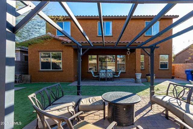 view of patio / terrace featuring a pergola and an outdoor fire pit