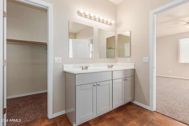 bathroom featuring vanity and ceiling fan