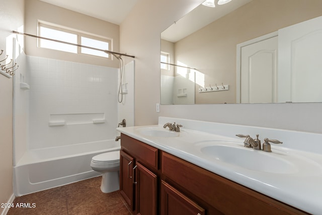 full bathroom featuring tile patterned floors, vanity, toilet, and shower / tub combination