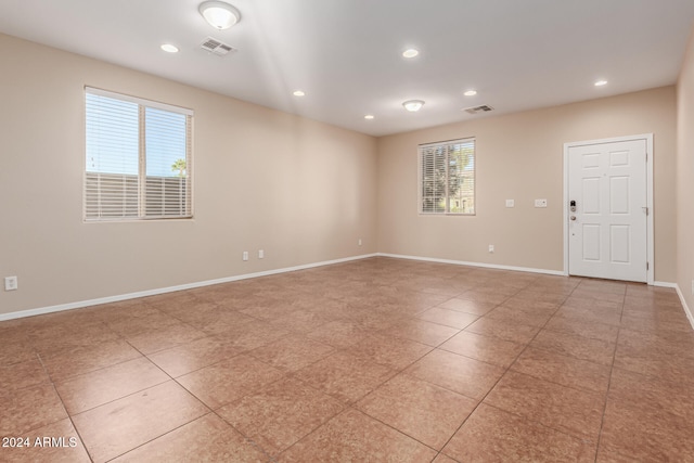 view of tiled spare room