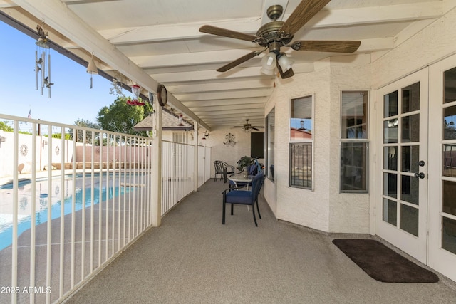 view of patio / terrace featuring a fenced backyard, a ceiling fan, and a fenced in pool