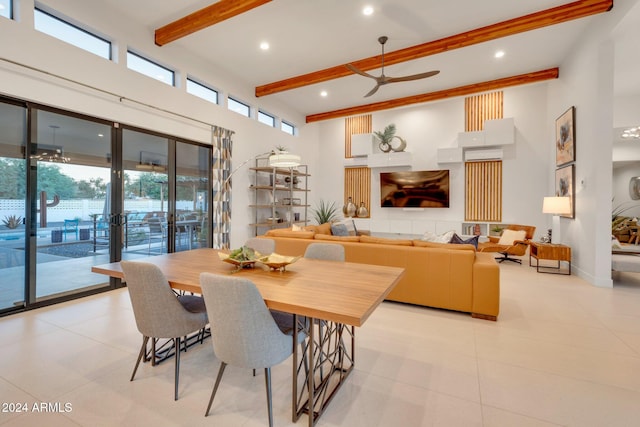 dining area featuring baseboards, a high ceiling, beam ceiling, and recessed lighting