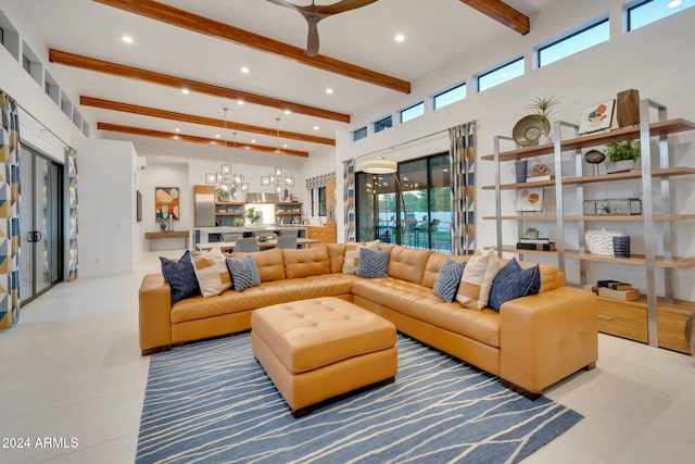 living room featuring a towering ceiling, beam ceiling, and recessed lighting