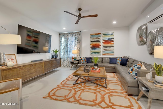 living room with a ceiling fan, recessed lighting, and a wall unit AC