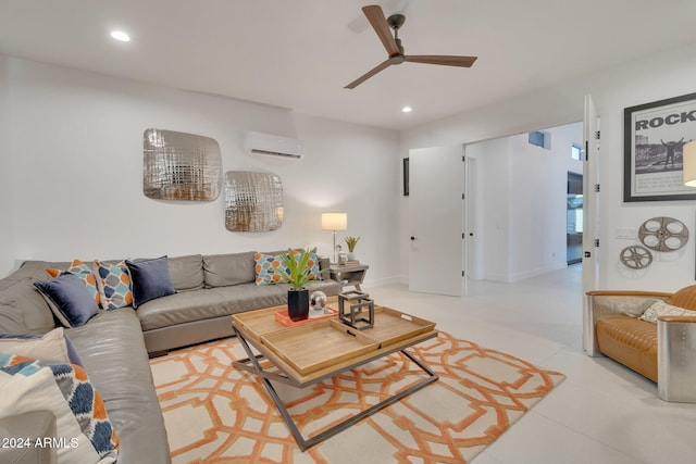 living area with ceiling fan, baseboards, an AC wall unit, and recessed lighting