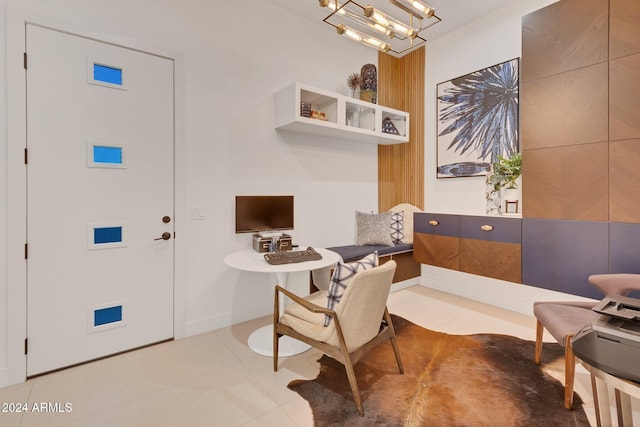 interior space with a chandelier and tile patterned floors