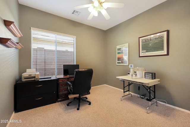 carpeted home office with ceiling fan