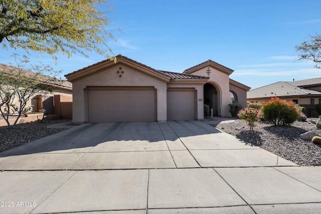 view of front of home with a garage