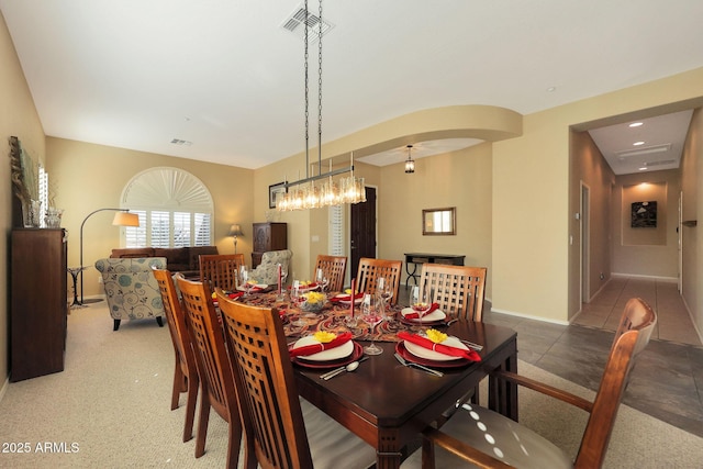 dining area with a chandelier