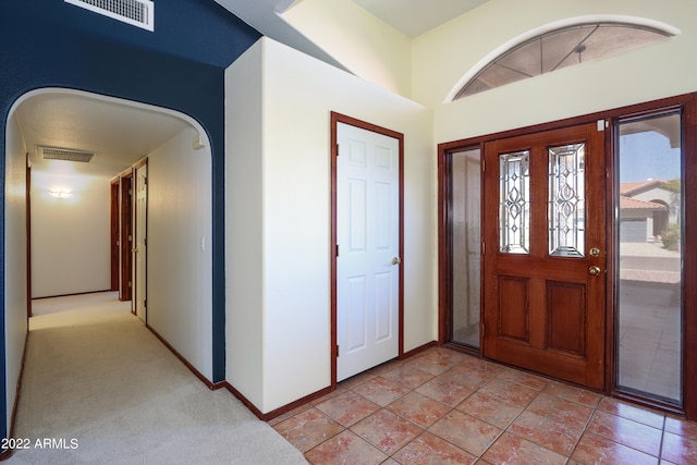 view of tiled foyer entrance