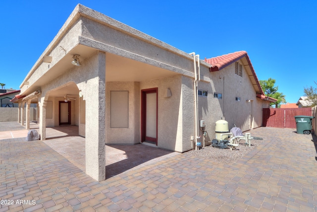 rear view of property with a patio area