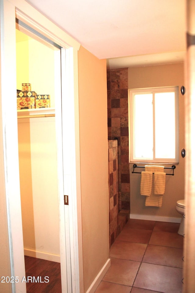 9939 W Ironwood Dr, Sun City, AZ 85351 - bathroom featuring toilet and tile patterned flooring