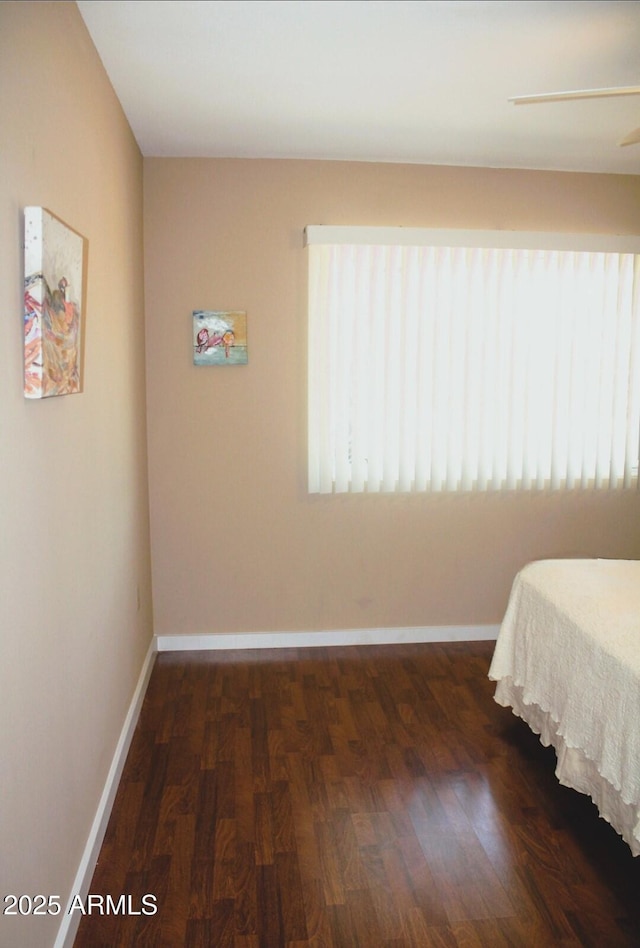 9939 W Ironwood Dr, Sun City, AZ 85351 - bedroom with wood finished floors