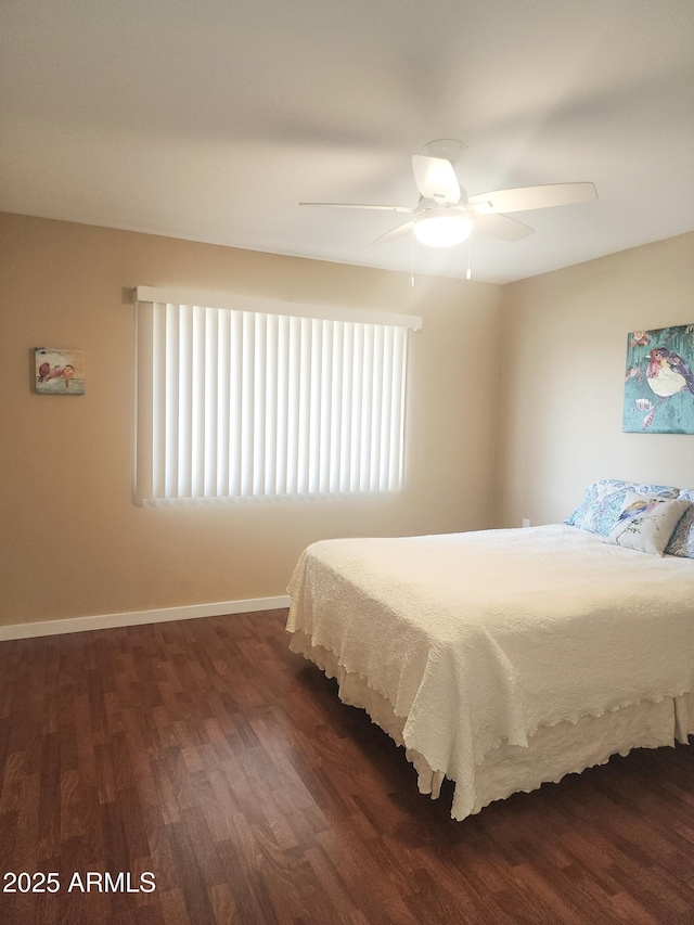 9939 W Ironwood Dr, Sun City, AZ 85351 - bedroom with wood finished floors and ceiling fan