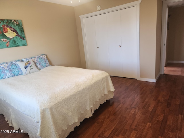 9939 W Ironwood Dr, Sun City, AZ 85351 - bedroom with wood finished floors and a closet